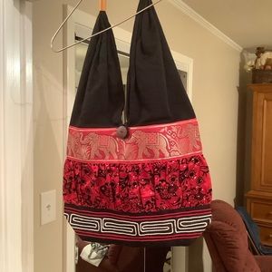 This is a beautiful, lined, Boho tote bag that has never been used.